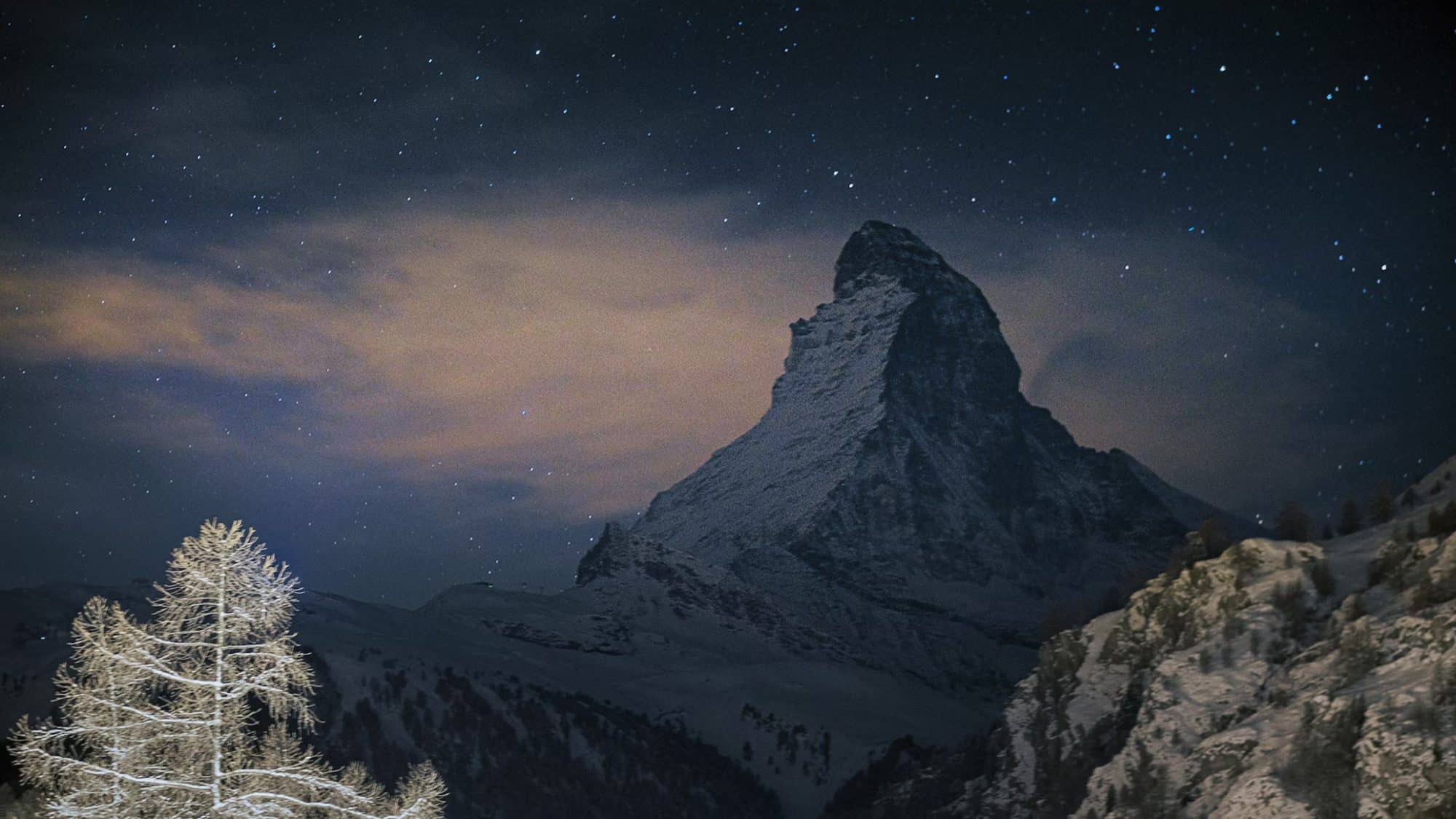 mountain in the distance at night in winter